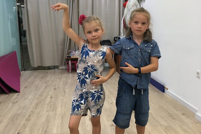 45 minutes flamenco dance class for family in Málaga - The Gentle Warm-Up Gets Everyone Moving