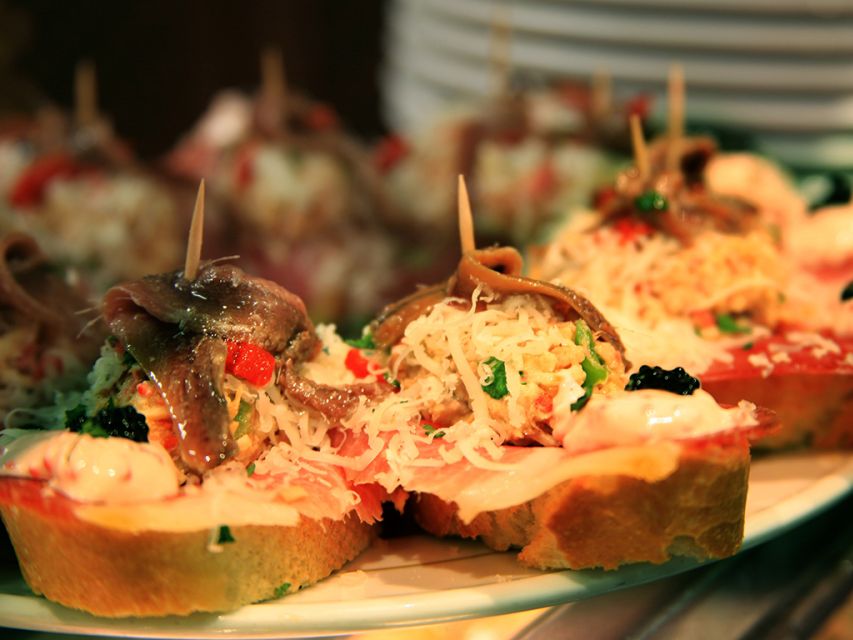 Barcelona: 4-Hour Tapas Evening Tour and Flamenco Show - Tapas in a traditional bar