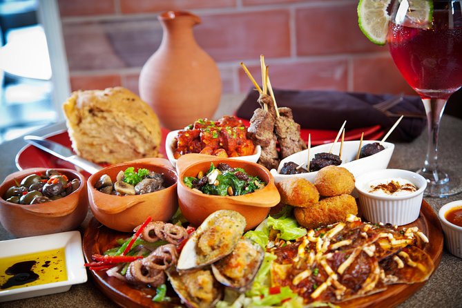 Barcelona Old Town Night Small Group Tour with Tapas & Flamenco - Las Ramblas and the one-hour tapas stop