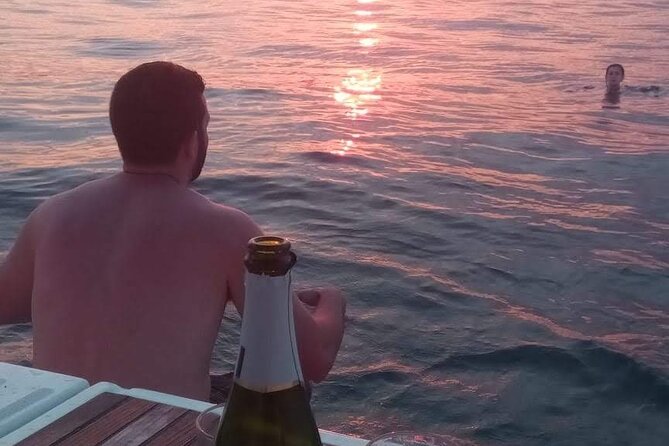 Barcelona Sunset Private Sailing & Live Spanish Guitar & open Bar - Spanish guitar, drinks, and a slower pace