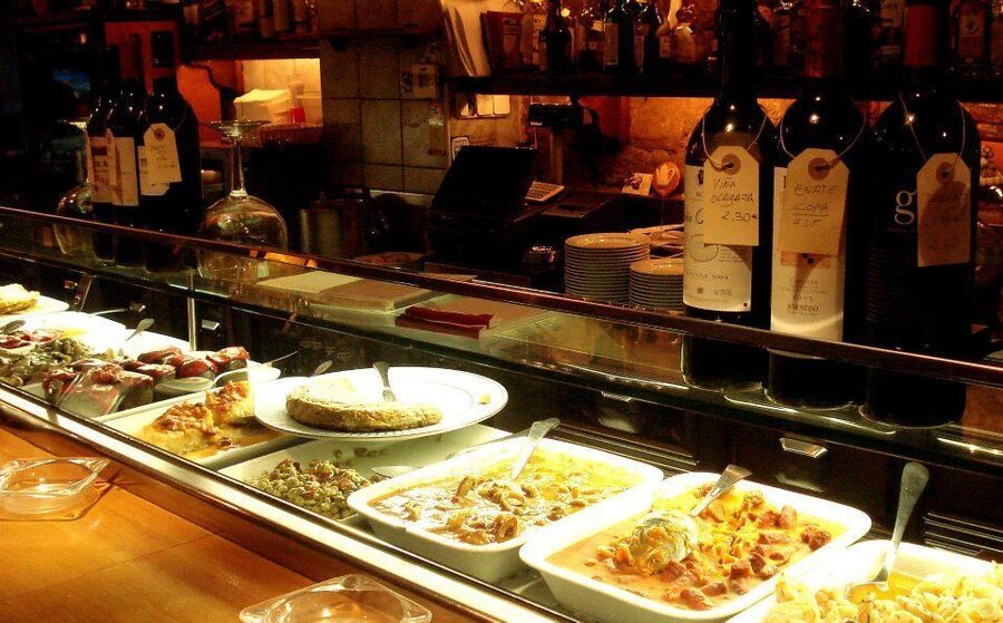 Barcelona: Tapas Walking Tour & Flamenco Show - First stop: tapas in Eixample