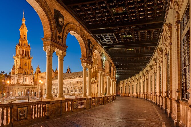 Seville Night Tour with Tablao Flamenco Show - Seeing the Royal Palace and riverfront from the coach